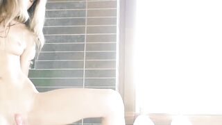 Little lady Gina Gerson toys herself under the shower