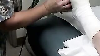 Foot cast placed on twink and his leg before being taken off