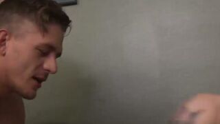 Alexander pulls Sams thick cock and puts it in his mouth