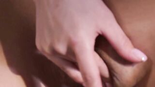Naughty tall babe Milan Cheek cant restrain herself from stoking her pussy