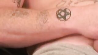 Tattooed amateur jerks off his rock hard cock before cumshot