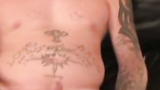Tattooed amateur jerks off his rock hard cock before cumshot