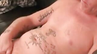 Tattooed amateur jerks off his rock hard cock before cumshot