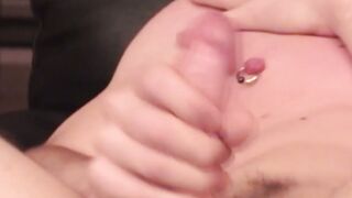 Amateur with many piercings plays with his ass and cock