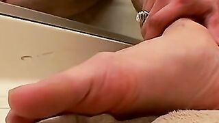 Bathroom cumshot all over this jock and his sexy feet too