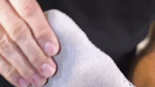 Hairy muscular stud receives foot worship and toe licking