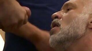 Mature man swallowing two cocks and eating cum in the end