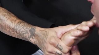 Bearded guard Rikk York receives foot licking from prisoner