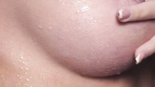 Erotic nubile babe Niemira feels her big tits while teasing