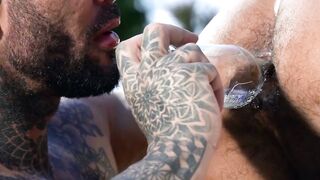 Tattooed muscle men Danny Starr and Andre Bedford bareback hard