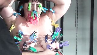 Brunette on suspension rope takes crotch bondage and punches