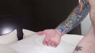 Tattooed bearded jock Reid Trasher rides big cock bareback