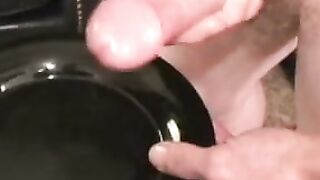 Tattooed slim amateur masturbates solo and cums on plate