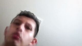 Petite Latino gay Roman Blake jerks off his load into hand