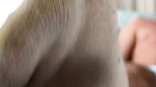 Bearded solo hunk admires his own feet while being recorded