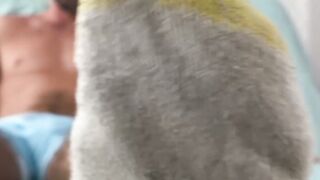 Bearded solo hunk admires his own feet while being recorded