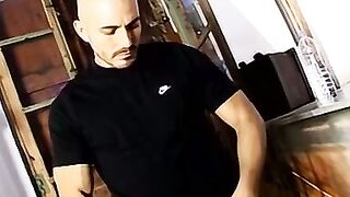 Big dick muscle stud shoves dildo in his ass to piss more