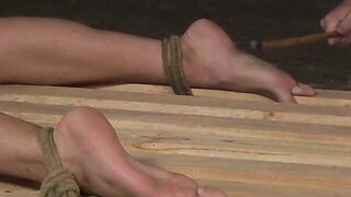 Restrained sub Axel Rubberax spanked and tickled by dom