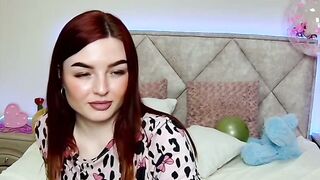 Redhead amateur babe NicolPot strips pajamas and shows tattoo on webcam