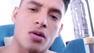 Muscular hottie Santiago Rodriguez flexes his tight asshole while stroking his cock