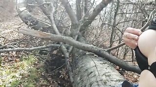 Solo female masturbates outdoors near the road