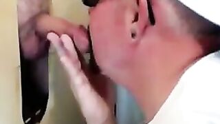 Horny dude with glasses enjoys in a glory hole scene