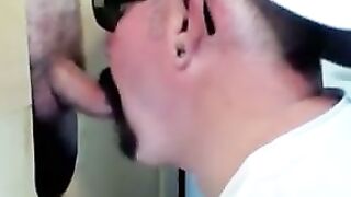 Horny dude with glasses enjoys in a glory hole scene
