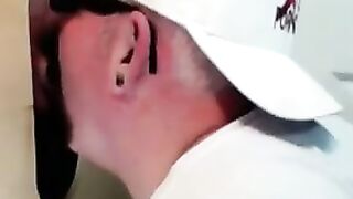 Horny dude with glasses enjoys in a glory hole scene