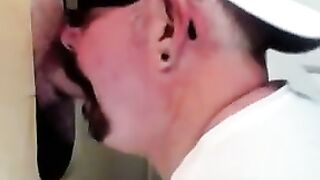 Horny dude with glasses enjoys in a glory hole scene