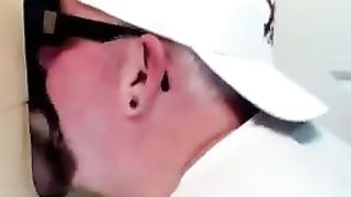 Horny dude with glasses enjoys in a glory hole scene