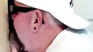 Horny dude with glasses enjoys in a glory hole scene