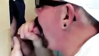 Horny dude with glasses enjoys in a glory hole scene