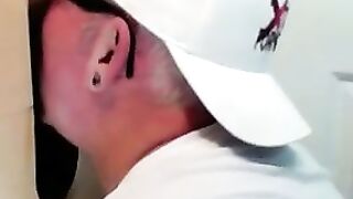 Horny dude with glasses enjoys in a glory hole scene
