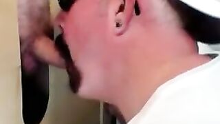 Horny dude with glasses enjoys in a glory hole scene