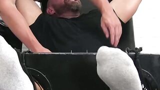 BDSM foot tickling torment with restrained bearded hunk