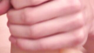 Young man tugging his big cock and toying his sweet ass