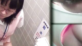 Young Japanese sluts pissing in public toilet with spy cam