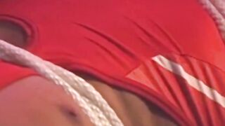Hunk in uniform is tied up as he tries to release himself