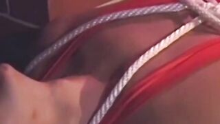 Hunk in uniform is tied up as he tries to release himself
