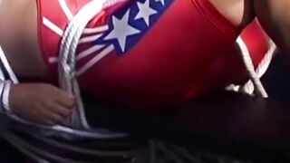 Hunk in uniform is tied up as he tries to release himself