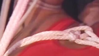 Hunk in uniform is tied up as he tries to release himself
