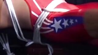 Hunk in uniform is tied up as he tries to release himself