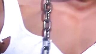 Tattooed man in uniform cant release himself from chains