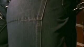 Tattooed man in uniform cant release himself from chains