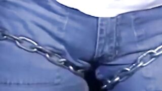 Tattooed man in uniform cant release himself from chains
