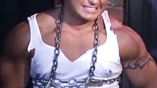 Tattooed man in uniform cant release himself from chains