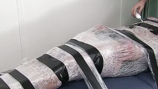 Restrained hunk endures tickling torment from his dom