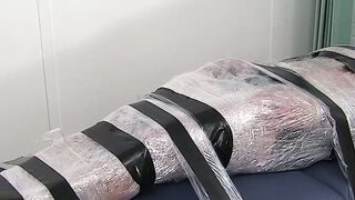 Restrained hunk endures tickling torment from his dom