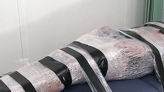 Restrained hunk endures tickling torment from his dom