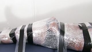 Restrained hunk endures tickling torment from his dom
